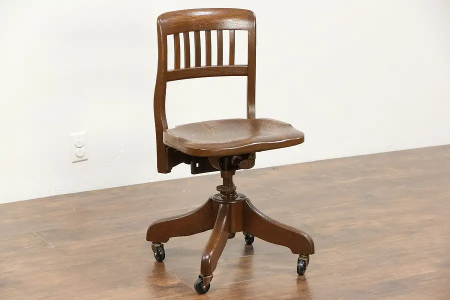 Main image of Oak 1925 Antique Swivel Adjustable Desk Chair, Signed Revells Chicago