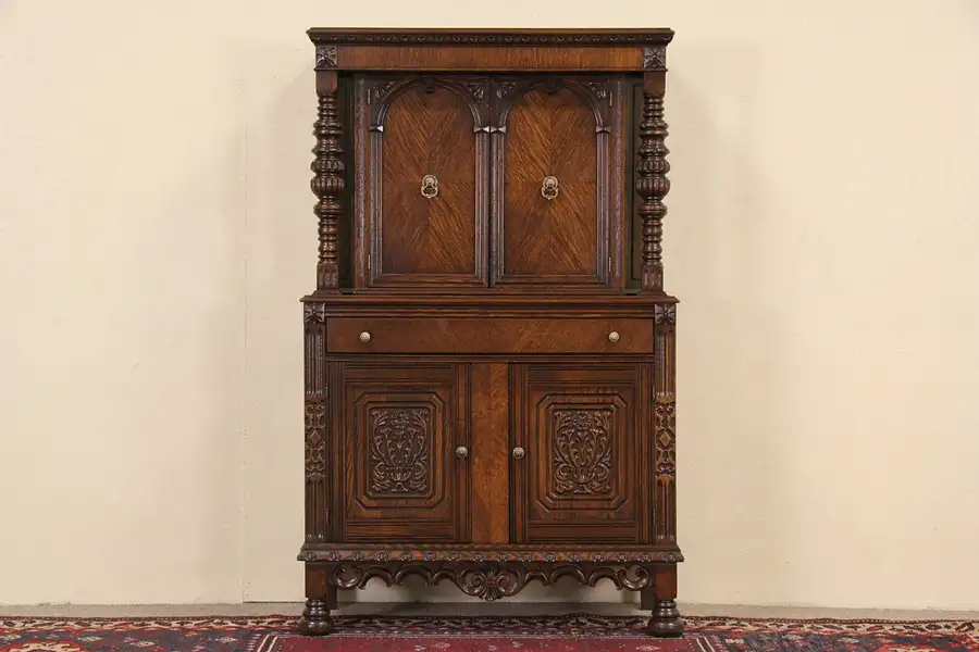 Main image of Oak English Tudor 1920's Carved Oak China Cabinet