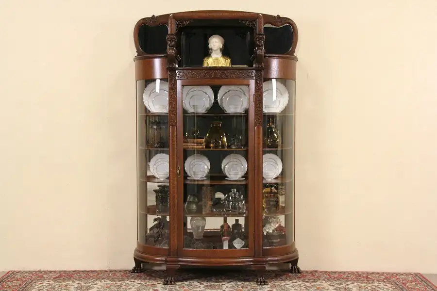 Main image of Curved Glass 1900 Antique Oak Curio China Display Cabinet, Carved Figures