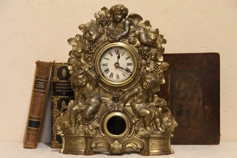 Main image of Victorian Antique Iron Clock, Cherubs & Angels