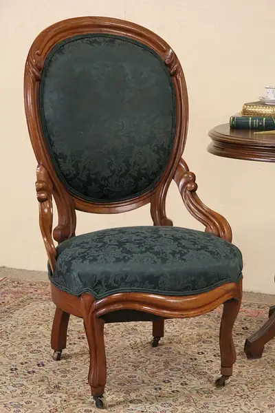 Main image of Victorian 1850's Antique Carved Walnut Balloon Back Chair