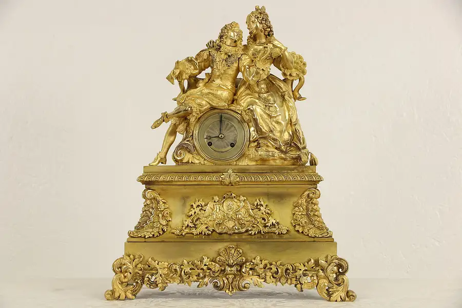 Main image of French Gilt Bronze Figural 1820's Antique Silk Suspension Mantel Clock