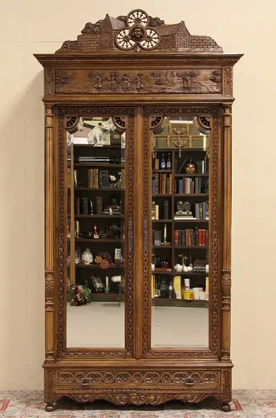 Main image of Brittany Carved Antique Chestnut 1900 Armoire with Folk Scene