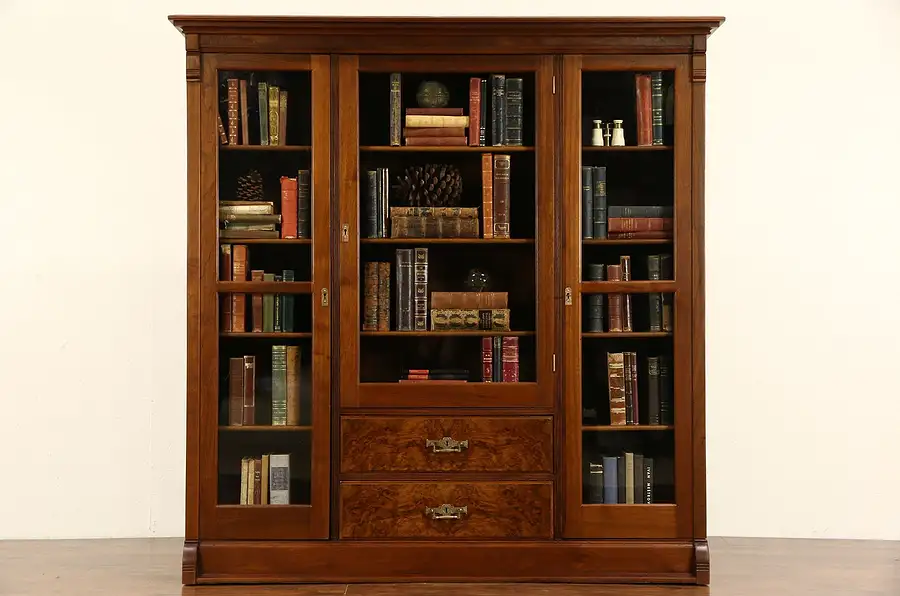 Main image of Victorian Eastlake 1885 Antique Walnut Triple Library Bookcase, Wavy Glass Doors