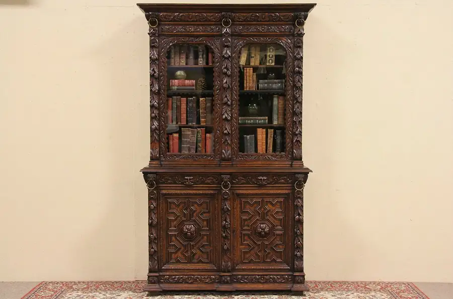 Main image of Carved Oak 1890's French Bookcase, Lion Heads & Old Wavy Glass