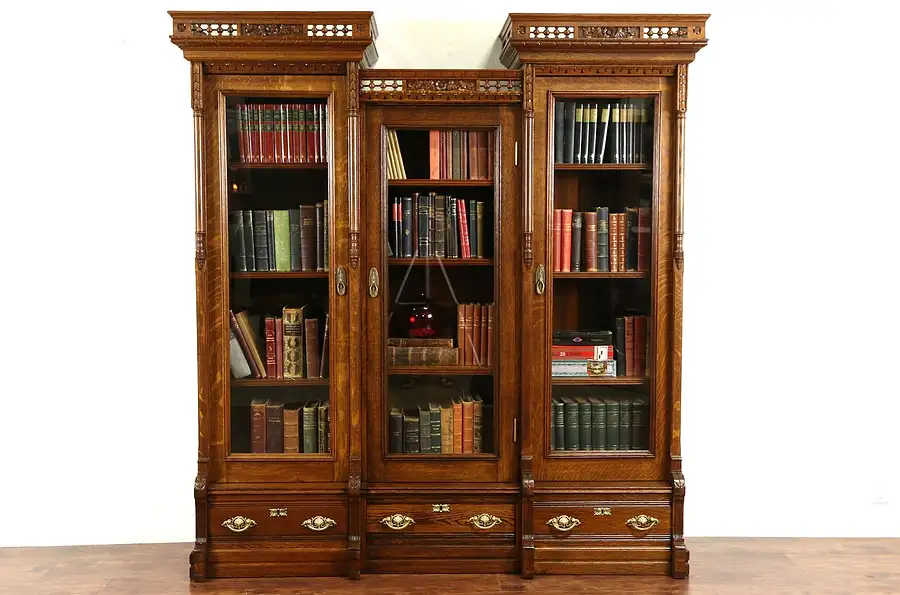 Main image of Victorian Eastlake 1880's Antique Carved Oak Triple Library Bookcase