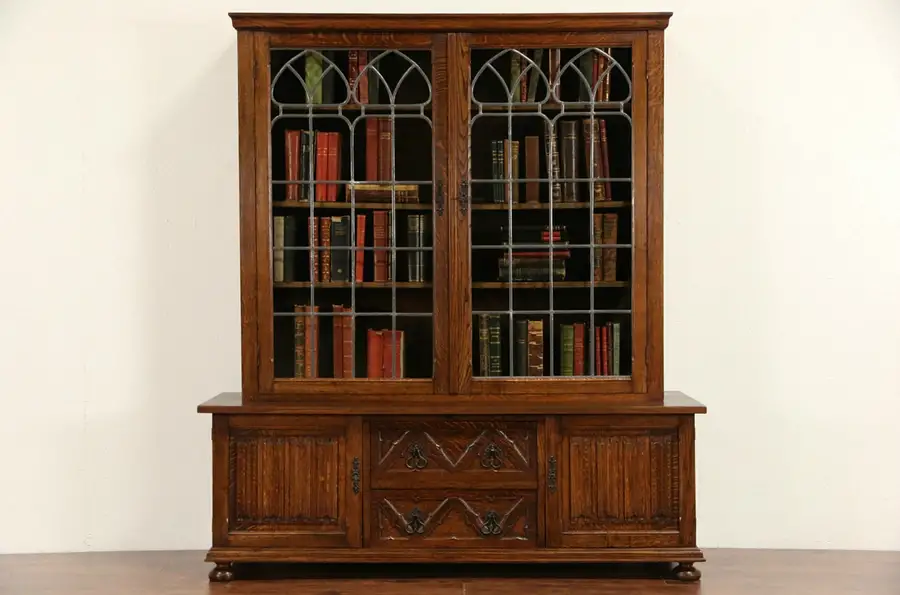 Main image of Dutch Renaissance Carved 1920's Vintage Oak Bookcase, Leaded Glass Doors