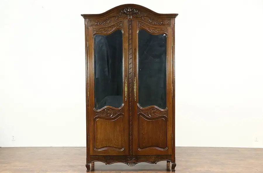 Main image of French Antique 1890 Hand Carved Oak Armoire or Wardrobe, Beveled Mirrors
