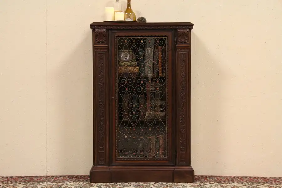 Main image of Carved Antique Bookcase, Iron Grillwork