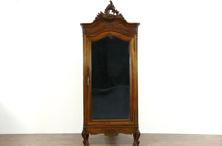 Main image of French Carved Walnut 1900 Antique Armoire, Beveled Mirror Door