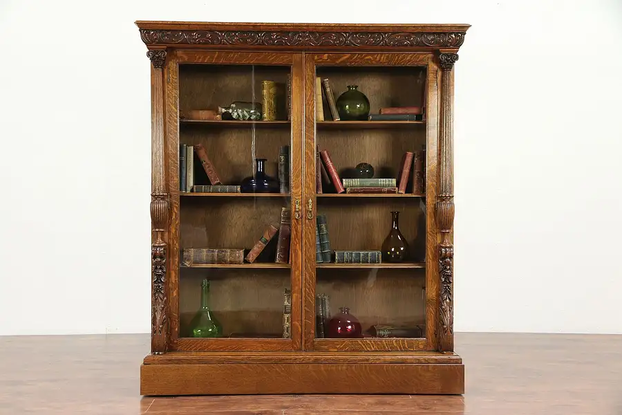 Main image of Oak Carved Antique 1895 Library Bookcase, Columns, Wavy Glass Doors