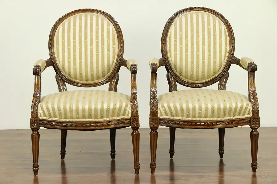 Main image of French Louis XVI Antique Pair Carved Fruitwood Armchairs