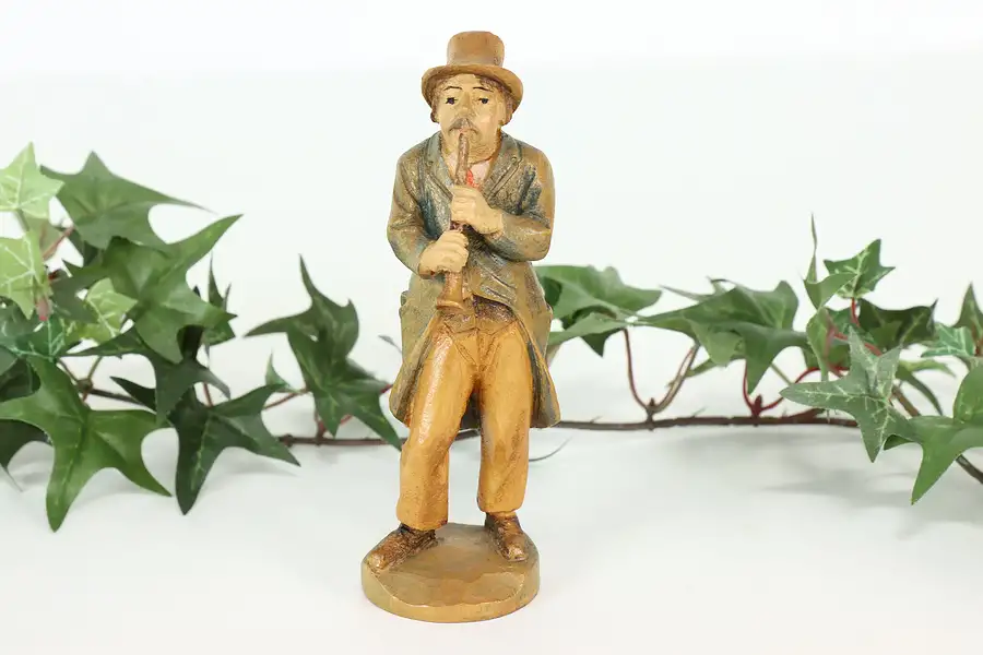 Main image of Man Playing Clarinet Hand Carved Vintage Alpine Sculpture