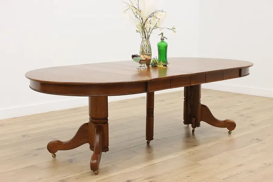 Main image of Arts & Crafts Antique 8' Oak 4' Round Dining Table, 5 Leaves