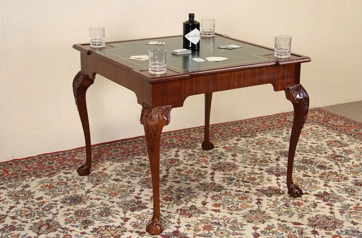 Kindel Carved Mahogany Game Table, Tooled  Leather