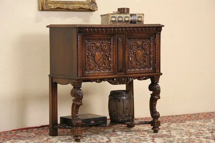 Black Marble Top 1920 Antique Console Cabinet, Carved Coats of Arms