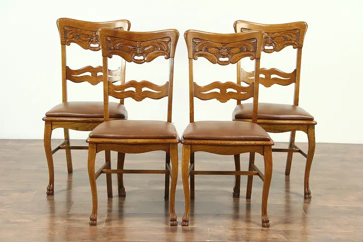 Set of 4 Antique North Wind Carved Oak Dining or Game Chairs, Leather Seats