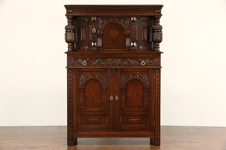English Tudor 1925 Antique China or Bar Cabinet, Carved Oak & Burl