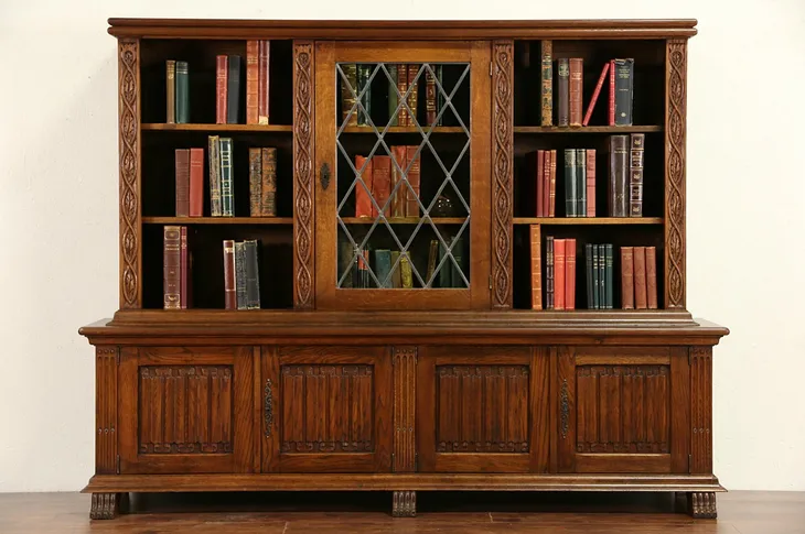 Oak Dutch 1920's Library Bookcase, Leaded Glass Door, Carved Linen Fold Panels