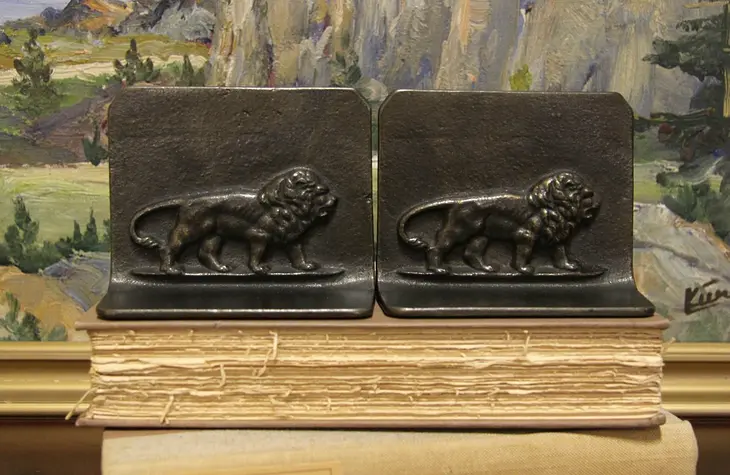 Pair of Antique Iron Bronze Finish Lion Bookends