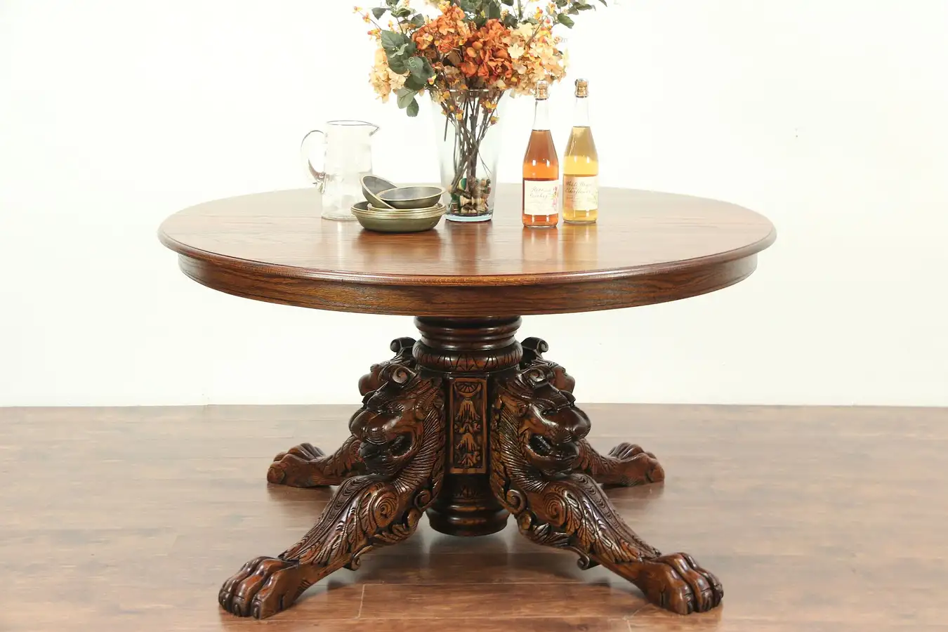 Main image of Oak Round 55" Vintage Dining Table, Carved Lion Heads & Paws
