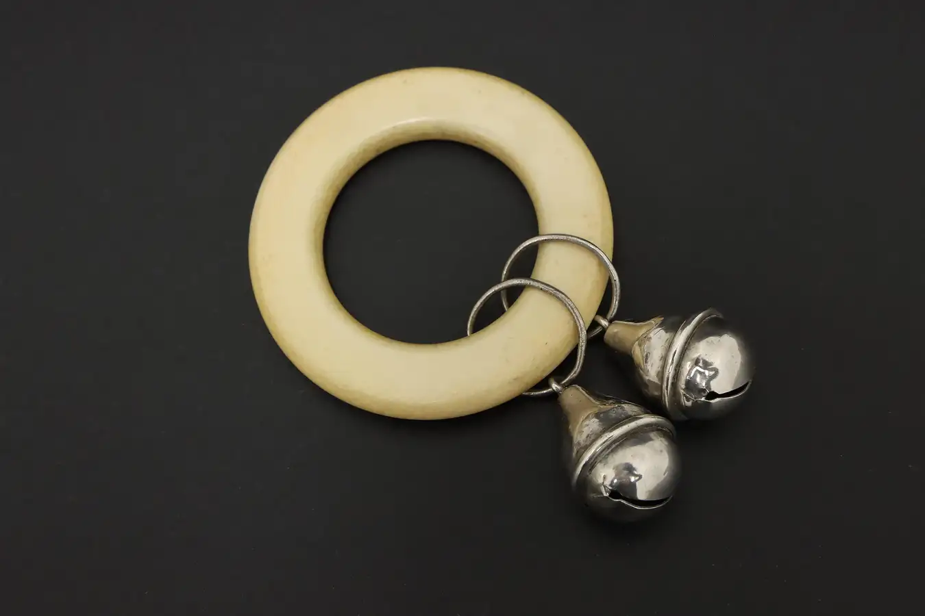 Main image of Traditional Antique Sterling Silver & Bakelite Baby Rattle