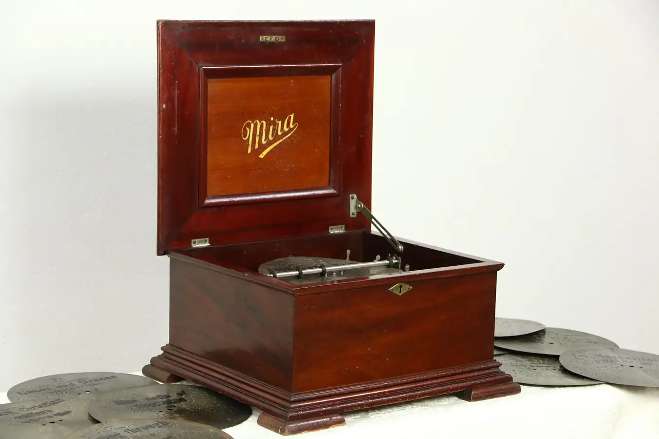 Main image of Mira Signed Swiss 1900 Antique Music Box, 10 Melody 9 1/2" Discs