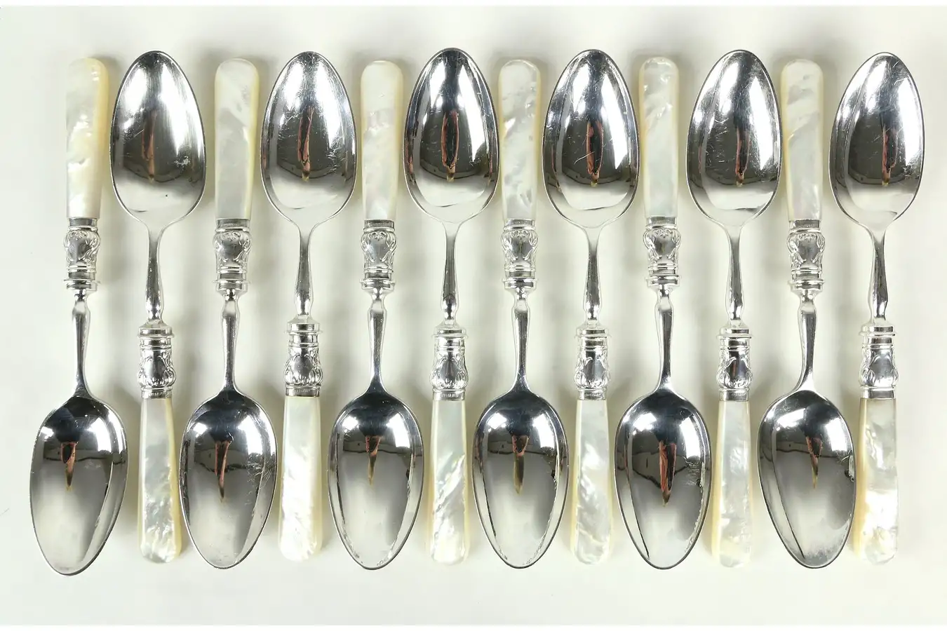 Main image of Set of 12 Mother of Pearl & Silverplate Soup, Pasta or Dessert Spoons, England
