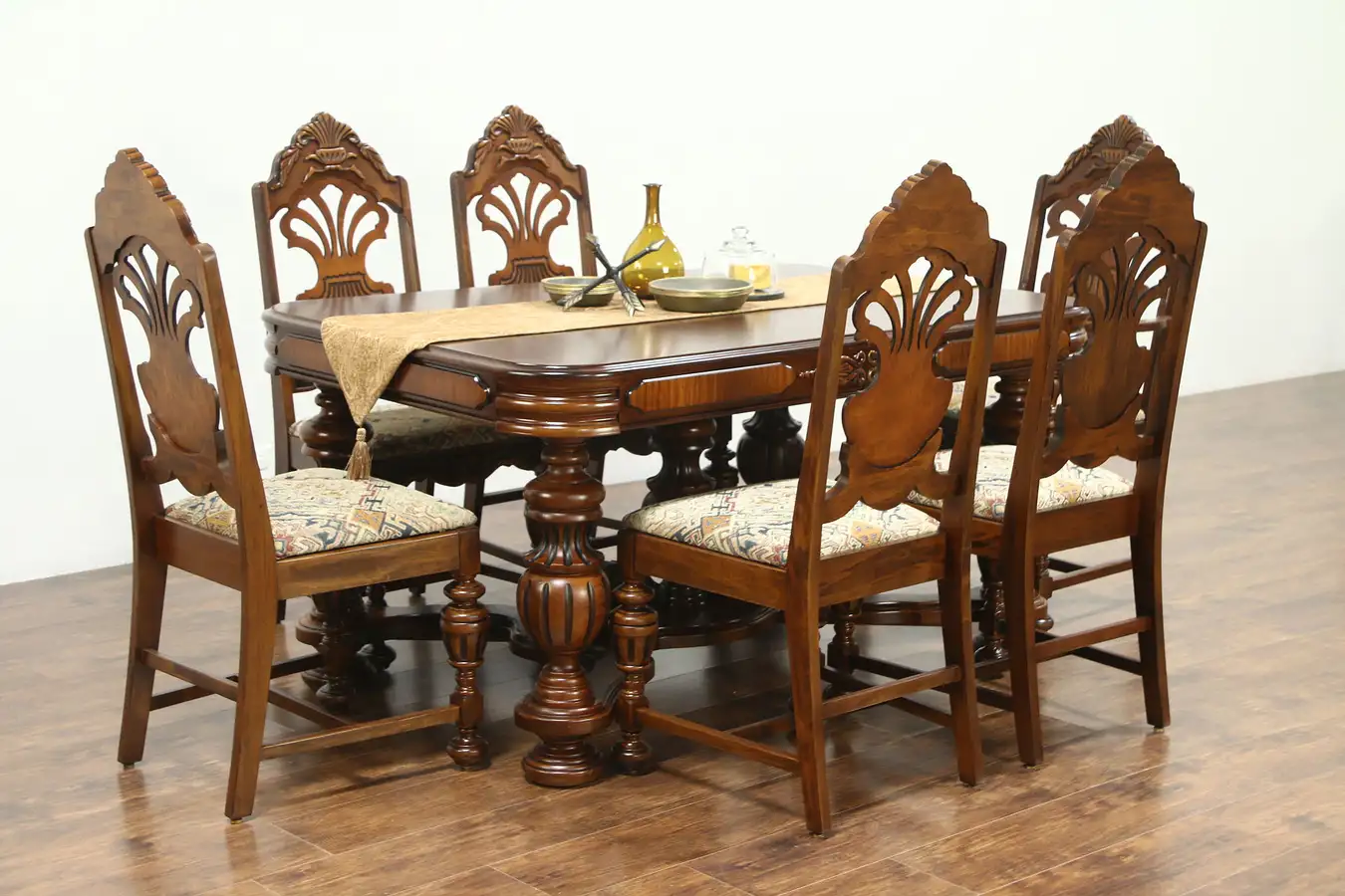 Main image of English Tudor Style 1925 Antique Carved Dining Set, Table, Leaf & 6 Chairs