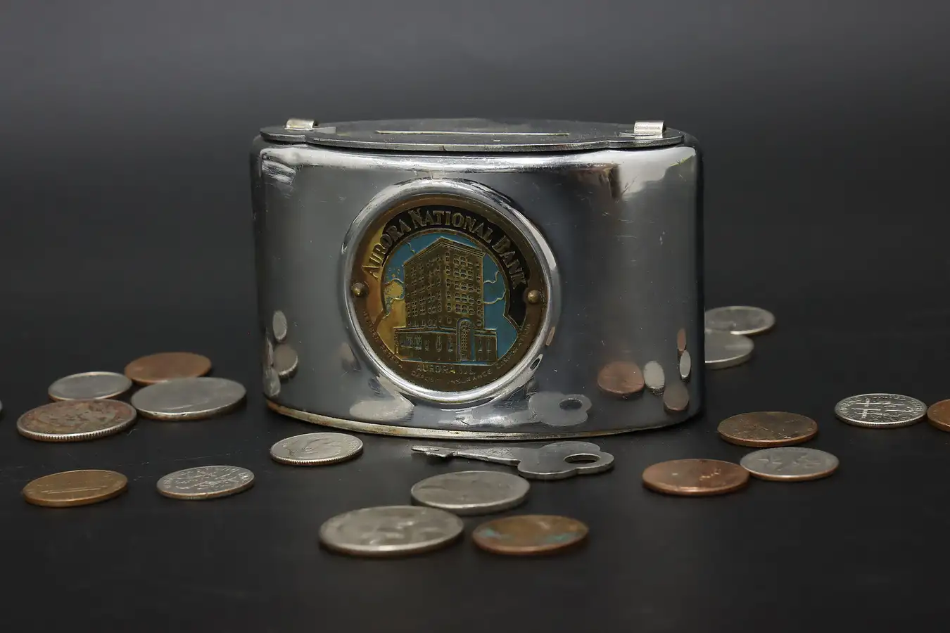 Main image of Nickel Plated Antique Recording Coin Bank, Aurora IL