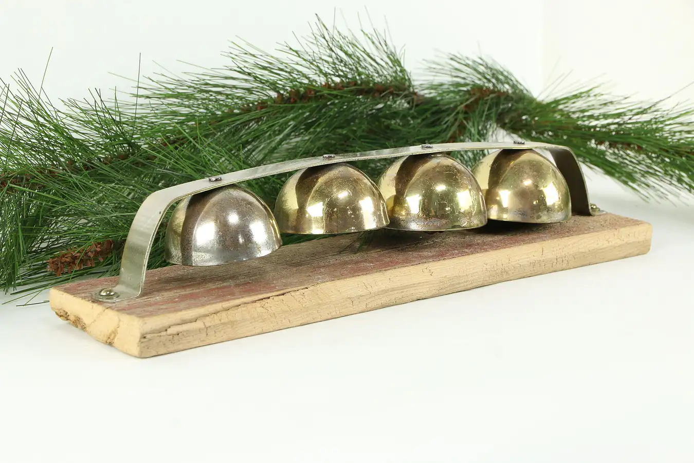 Main image of Set of 4 Antique Brass Sleigh Bells, Mounted on Board
