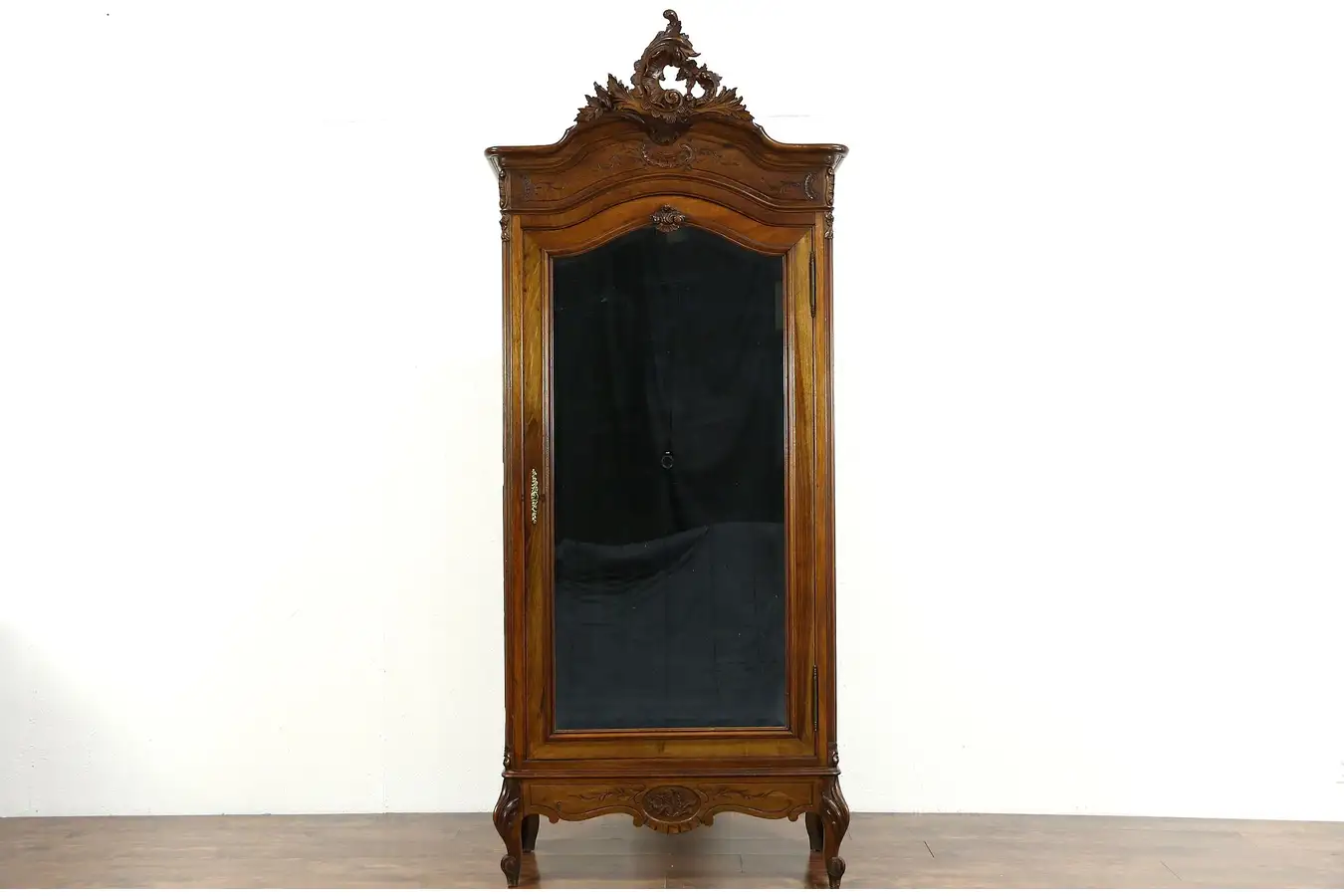 Main image of French Carved Walnut 1900 Antique Armoire, Beveled Mirror Door