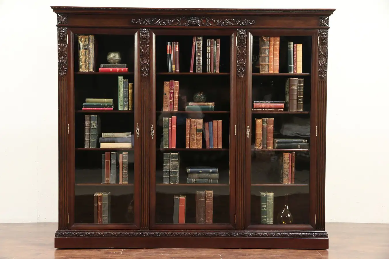 Main image of Triple Antique Mahogany Library Bookcase, Carved Gargoyles, Wavy Glass