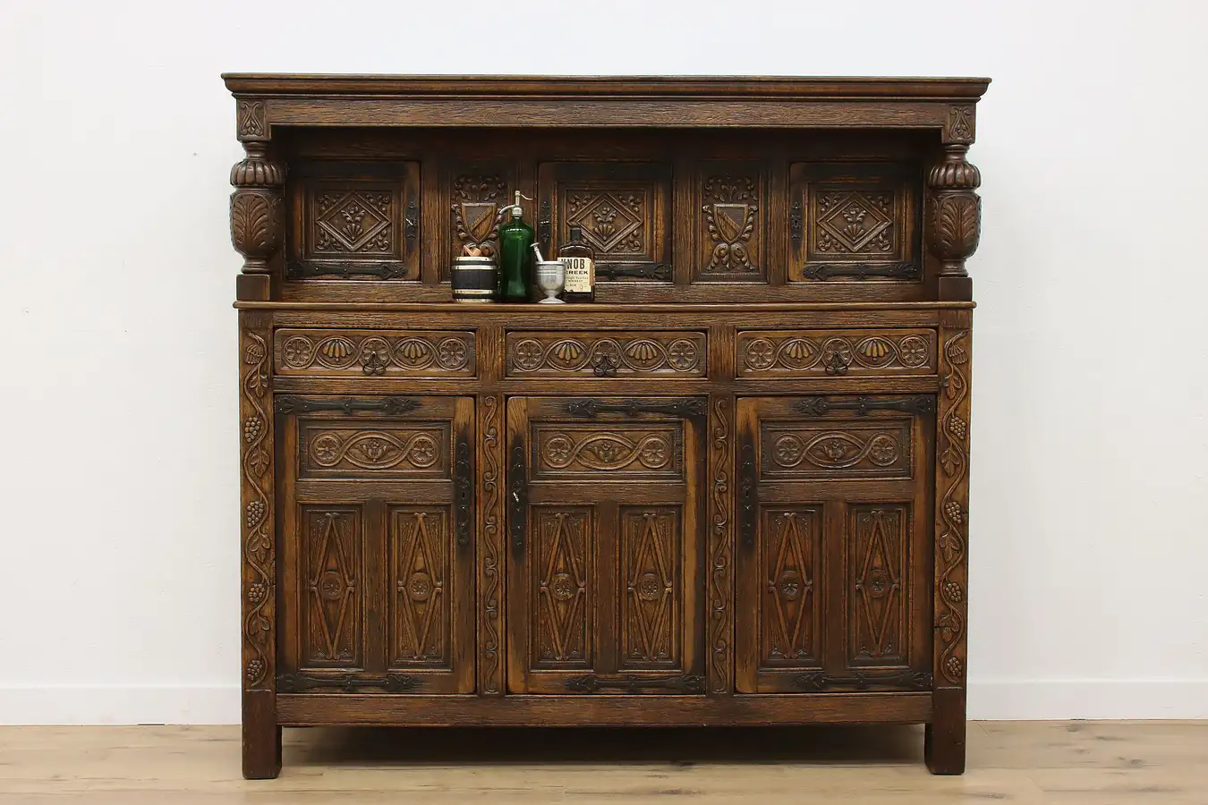 Main image of Tudor Antique Oak Cupboard Wine Bar Cabinet, Carved Grapes