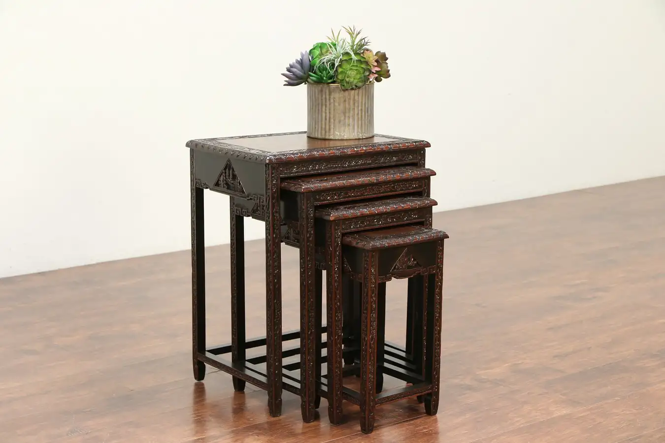 Main image of Chinese Set of 4 Antique Hand Carved Walnut Nesting Tables