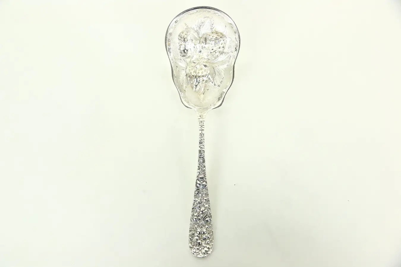 Main image of Embossed Berry Serving Spoon Repousse Sterling Silver by Kirk Stieff