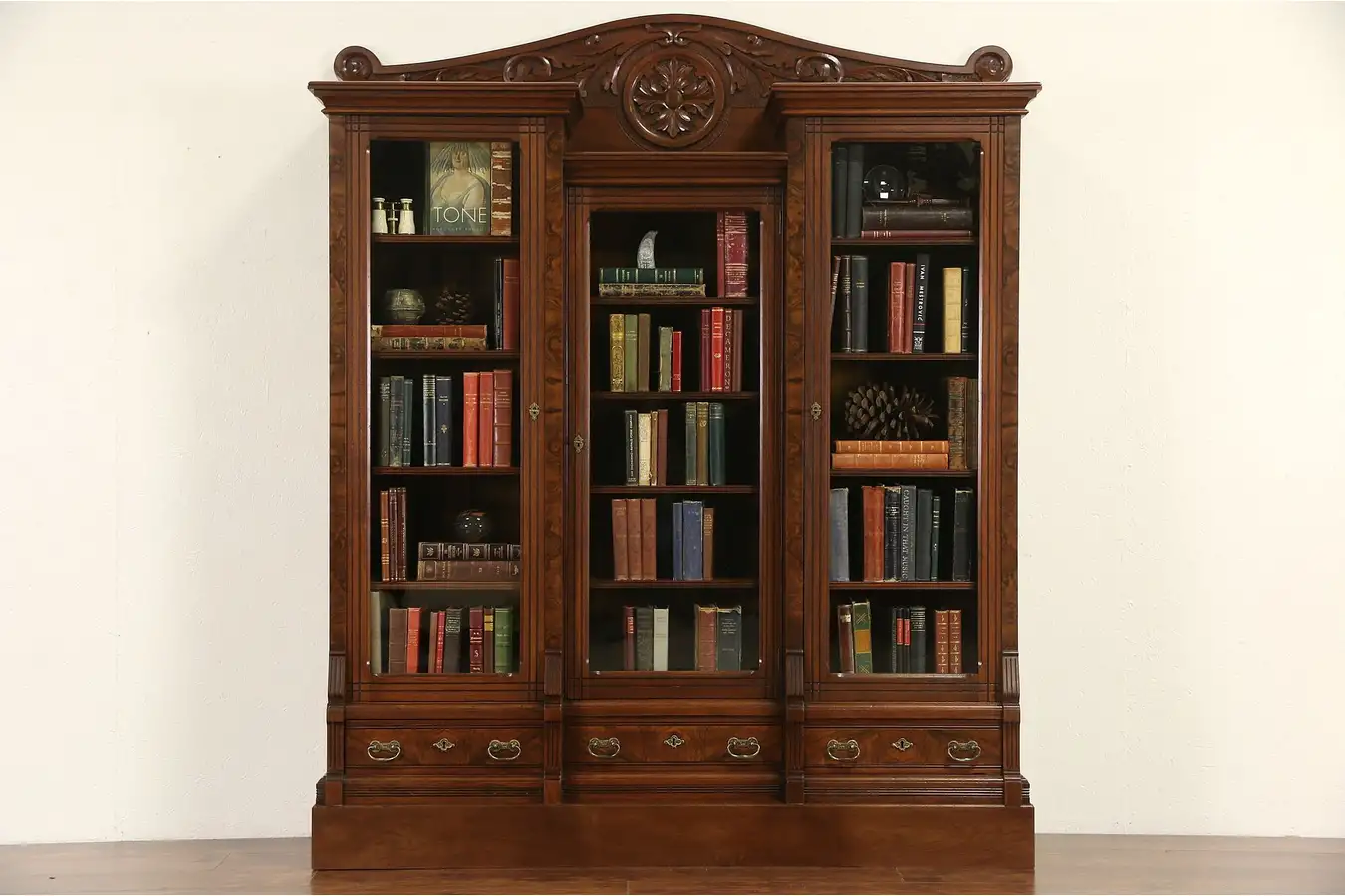Main image of Victorian 1870 Antique Carved Walnut Triple Library Bookcase, Wavy Glass