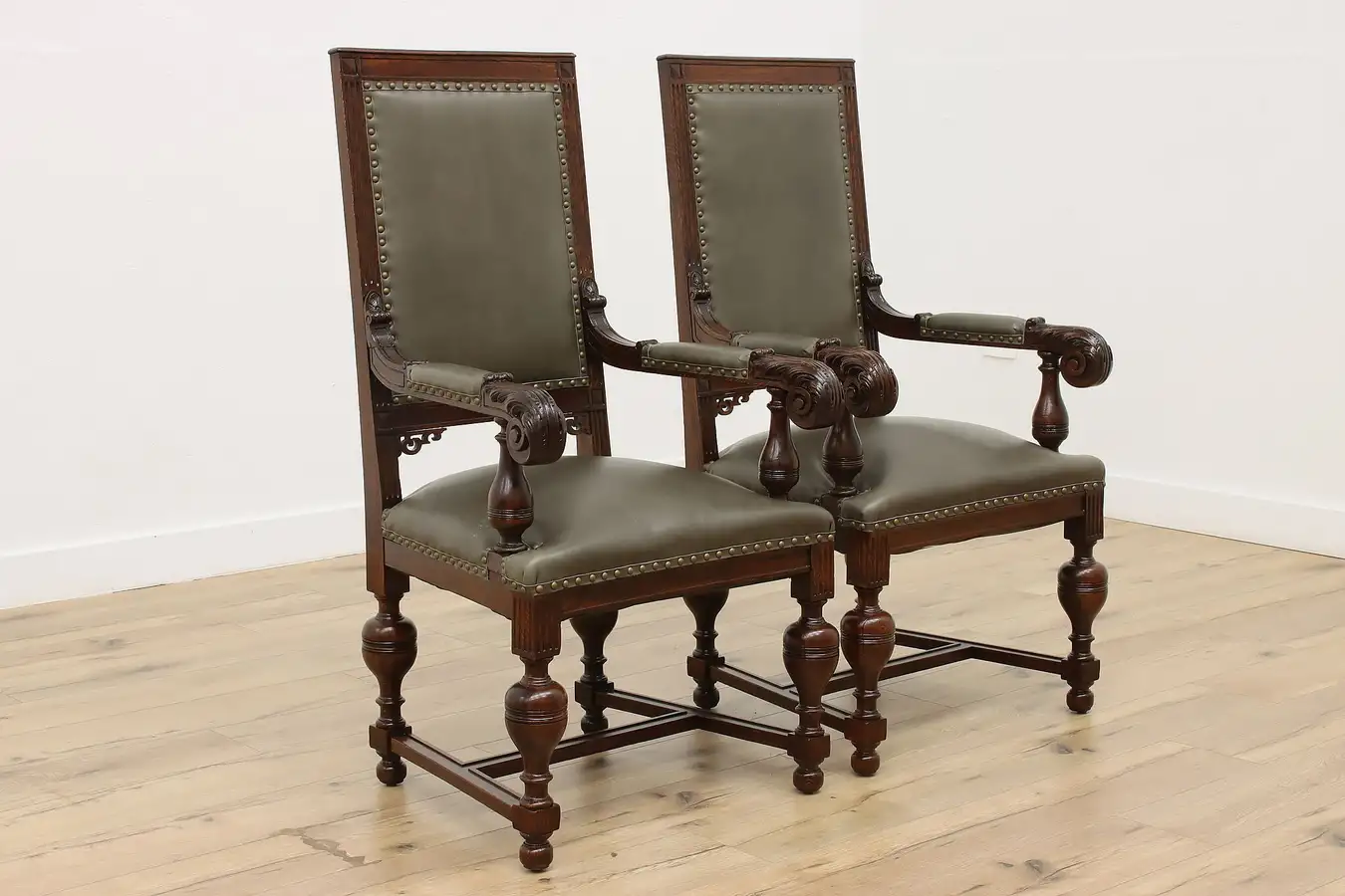 Main image of Pair of Renaissance Antique Carved Oak & Leather Hall Chairs