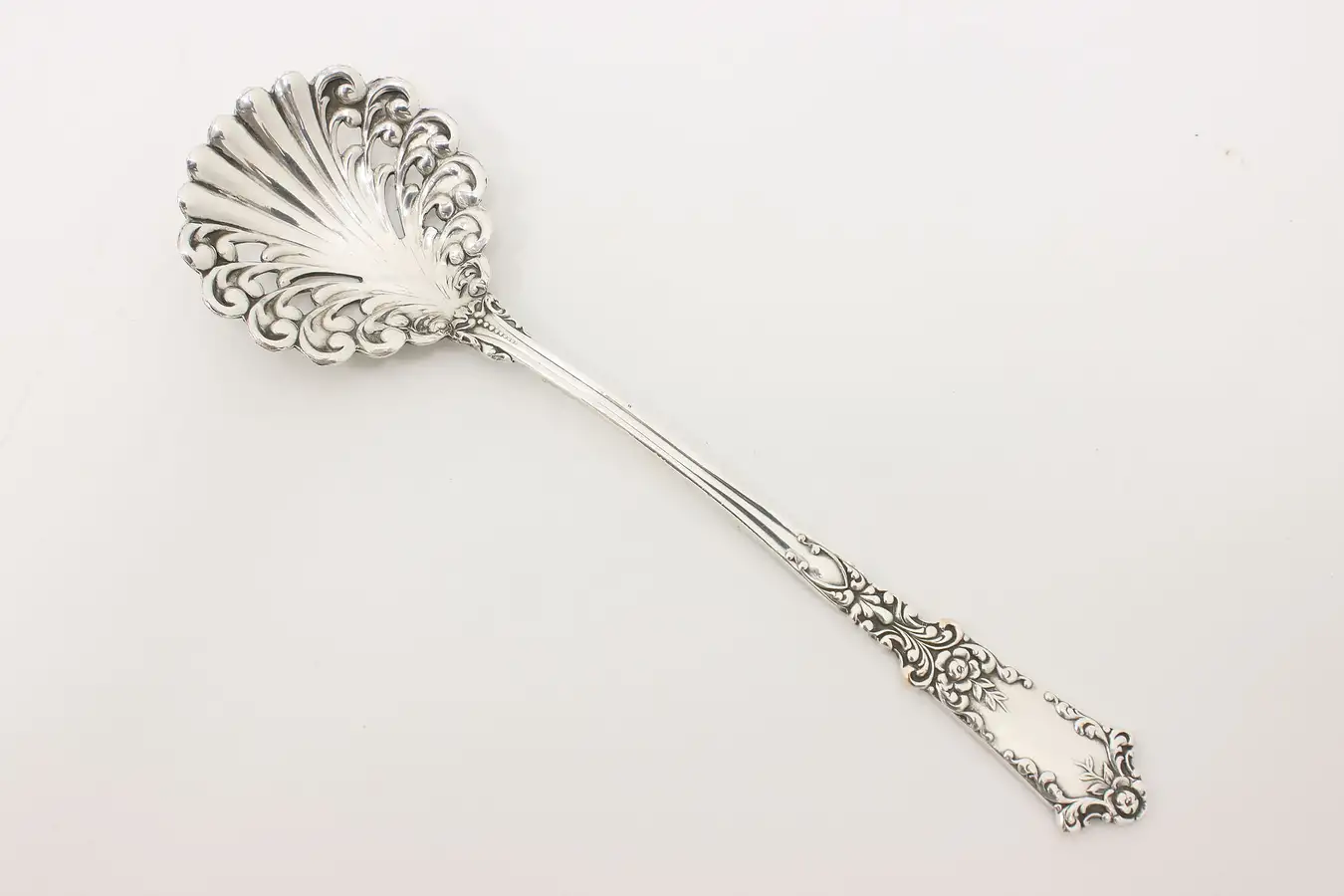 Main image of Victorian Antique Silverplate Serving Spoon, Shell & Flowers
