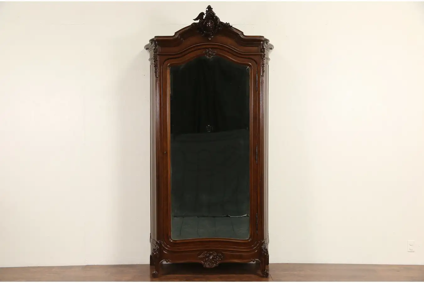 Main image of French 1900 Antique Hand Carved Walnut Armoire, Beveled Mirror Door