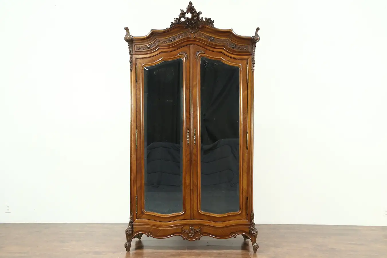 Main image of French Antique Carved Walnut Armoire, Beveled Mirror Doors