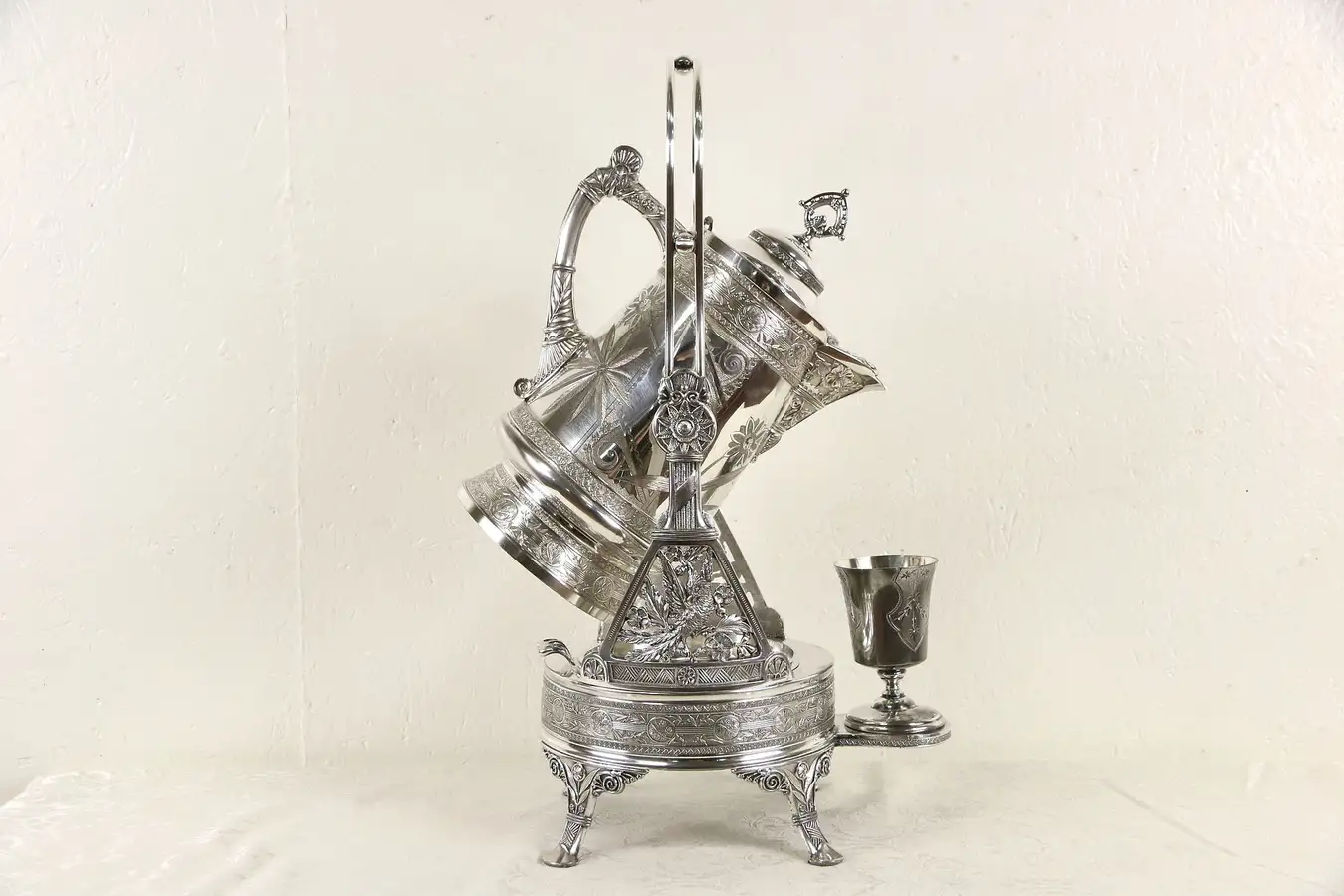 Main image of Victorian 1880 Antique Silverplate Tilting Water Pitcher & Stand, Pairpoint
