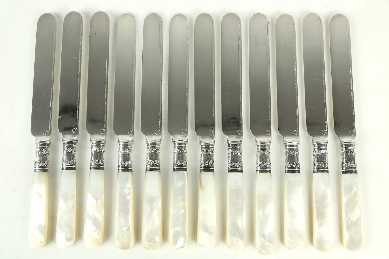 Main image of Set of 12 Mother of Pearl & Silverplate Antique 1900 Luncheon or Dinner Knives