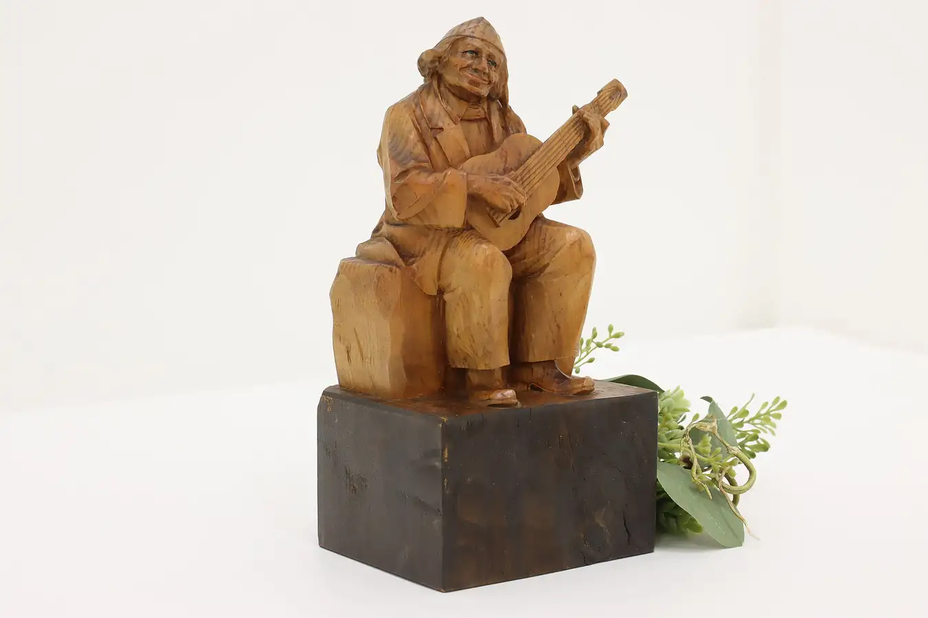 Main image of Swiss Folk Art Antique Carved Man Playing Guitar Sculpture
