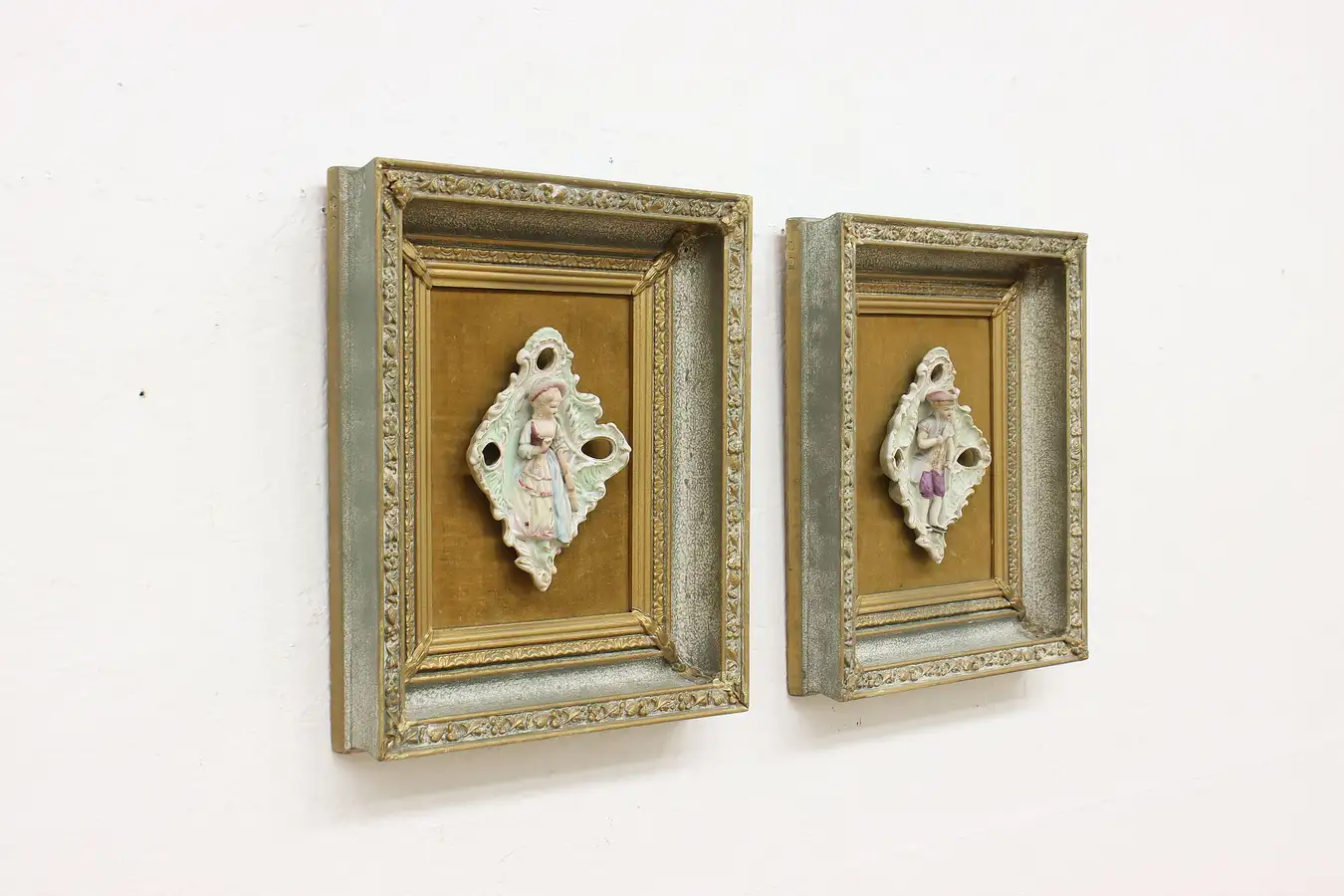 Main image of Pair of Framed Antique Painted Porcelain Relief Figures 16"