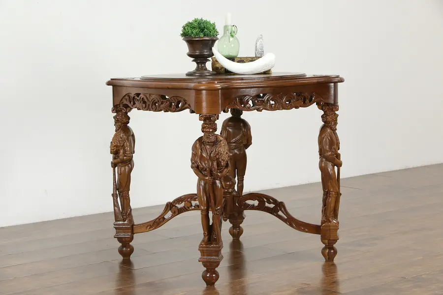 Photo of Hunting Lodge Antique Walnut Hall Center Table, Carved Hunter Sculptures