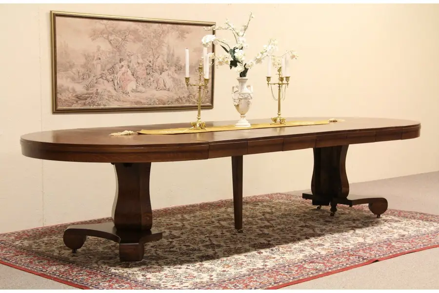 Photo of Round Oak 54" Pedestal Dining Table, Extends 10' 6"