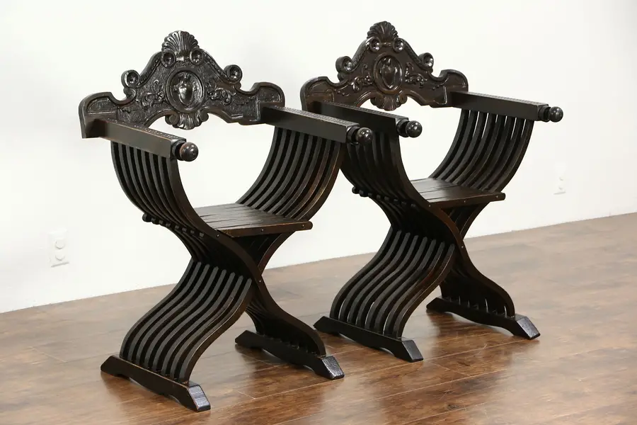 Photo of Savonarola 1890 Antique Pair of Italian Walnut Folding Chairs, Carved Crest
