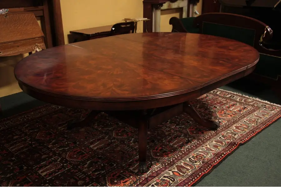 Photo of Sunburst Mahogany 5'4" Round Dining Table, 1 Leaf