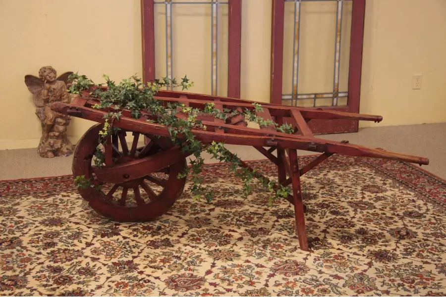 Photo of Hand Carved Antique Garden Wheelbarrow